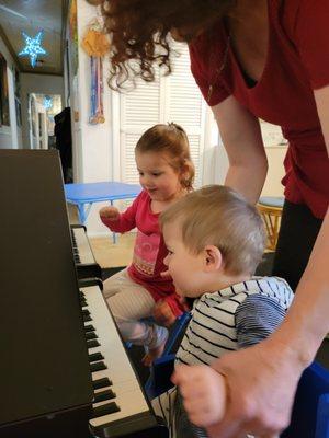 I am teaching 3 and 1 year old how to play on small Suzuki   toy pianos.  The pianos are in tune.