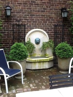 Courtyard garden with Garden Place accessories.