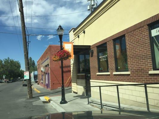 Elk horn Barber shop 1/2 block north of Main Street on N. Grand