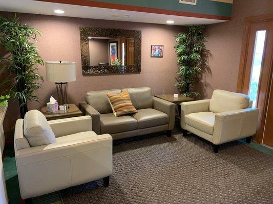 Client Lobby Seating area - adjacent wall has a self-serve coffee bar