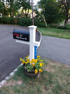 Installed new mailbox, post, planter, and flowers