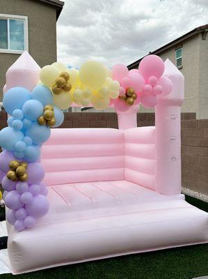 8ft Balloon Garland with our pink bounce house