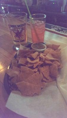 Homemade, warm tortilla chips, $3.50 well drinks, and $2 drafts. Life couldn't get better