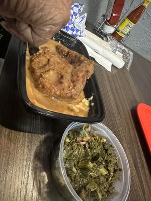 Smothered pork chop and greens. The greens were good.