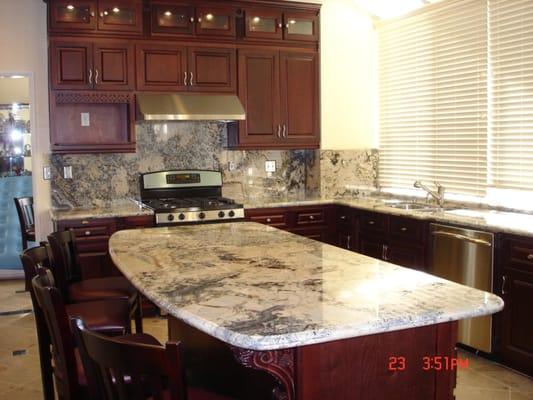 Cherry Cabinets with Granite Countertops and Island