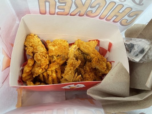 Spicy 4 piece tenders and super crispy seasoned waffle fries