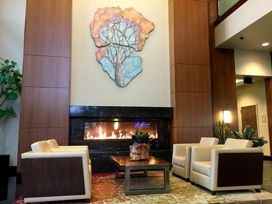 Cozy fireplace in the lobby foyer.