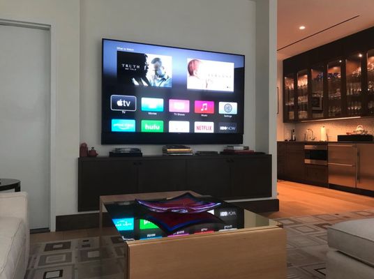 85" TV with Custom soundbar in this NYC Penthouse