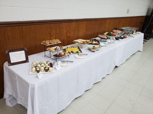 Catering tables on both sides with plenty of room for caterers.