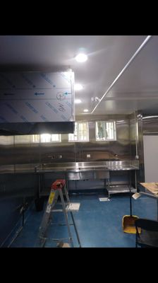 Completely kitchen steel wall installation and hood installation.