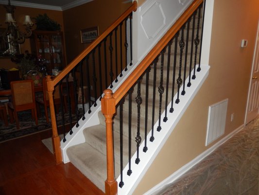 install new spindles & wainscoting on stairwell.