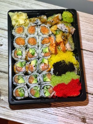 R7. Alaska Roll, R2. New York Roll, R10. Spicy Salmon Roll, A7. Shrimp Tempura, SR8. Tobiko Rainbow Special Roll