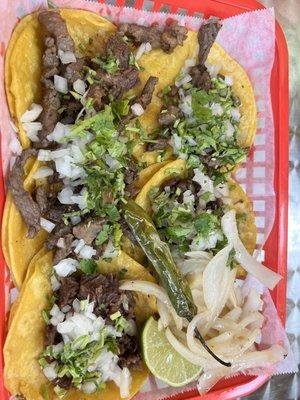 Mini tacos plate with fajita and Mexican BBQ meat.