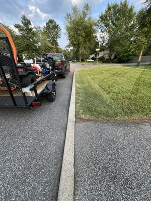 Cleanup for an extremely overgrown yard on a newly purchased home. (After)