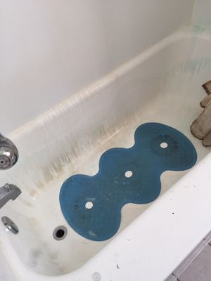 Before cleaning of a bathtub.