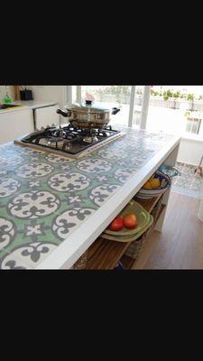 Kitchen island with maroccan mosaic tiles.