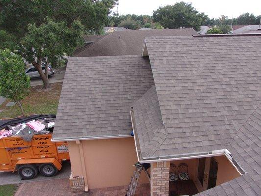 A recent residential shingle roof we completed.  The shingles shown are Owens Corning Oakridge in Driftwood.