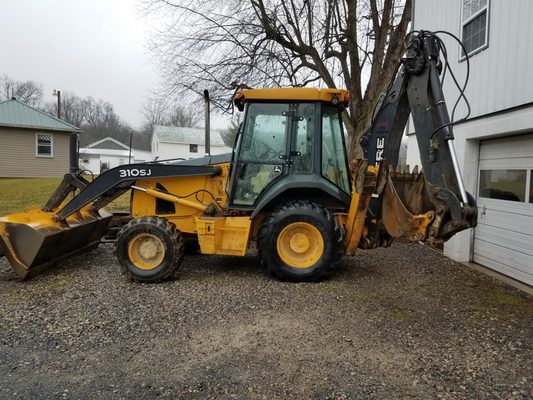 Our Customer's John Deere 310SJ with new 19.5L-24 Rear tires installed