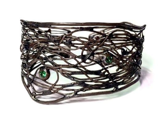 Cuff in blackened Sterling Silver with Tsavorite Garnets