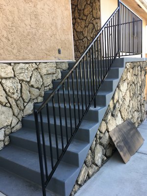 new up-to-code railing for steps/landing