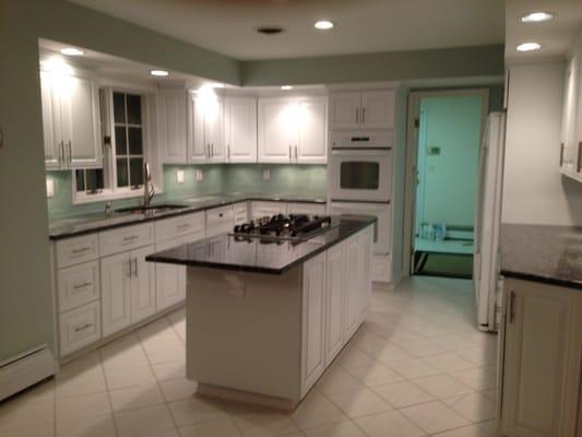 This kitchen was refaced and the island was refinished