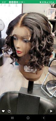 Custom-made wig with middle part.
All we need is your measurements.