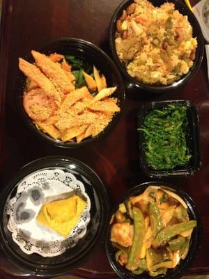 Pineapple fried rice, Papaya salad, mango shrimp, seaweed, and crab Rangoon