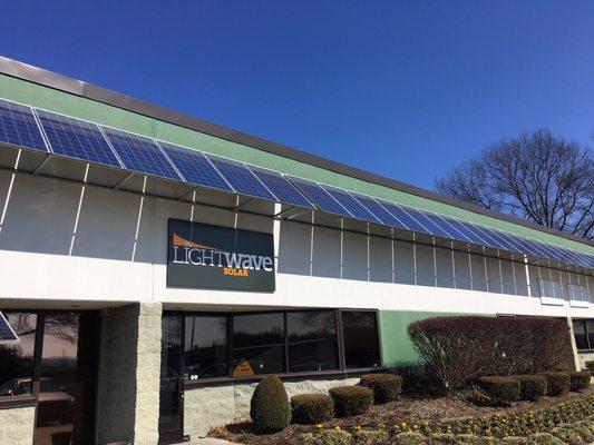 Our office is powered by solar! We have a solar awning and rooftop solar. We also provide EV charging.