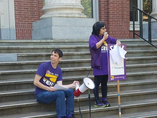 Organizer David and Local President Theo give an update on the steps of Johnson Hall.