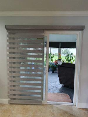 Zebra Shades
 The versatility of blinds paired with the elegance of a roma shade. Fabric slat roll up to let in sunlight.