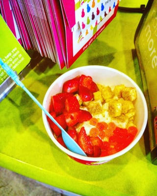 Banana Froyo with strawberries, cheesecake bites, and strawberry popping boba