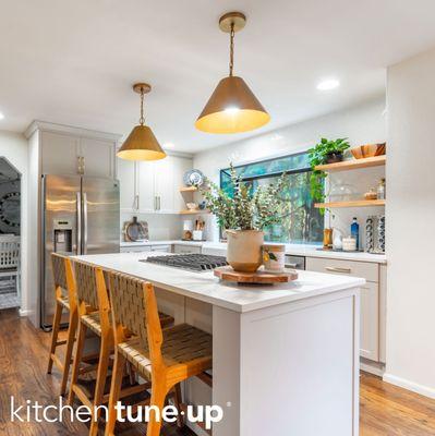 Timeless Elegance: Taupe Shaker Kitchen with Golden Accents