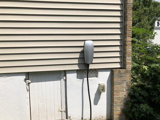 Tesla wall charger expertly installed at my home.