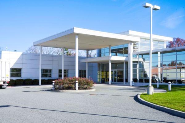 New Century Spine and Outpatient Surgical Institute's front entrance.